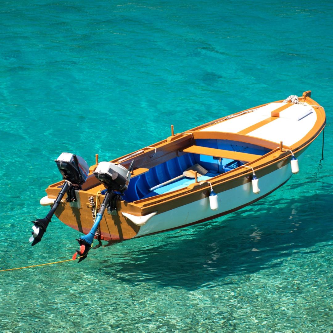 wooden-boat-on-turquoise-clear